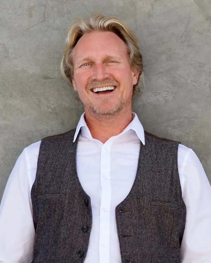 Team Happy Man Smiling With Hands In Pocket